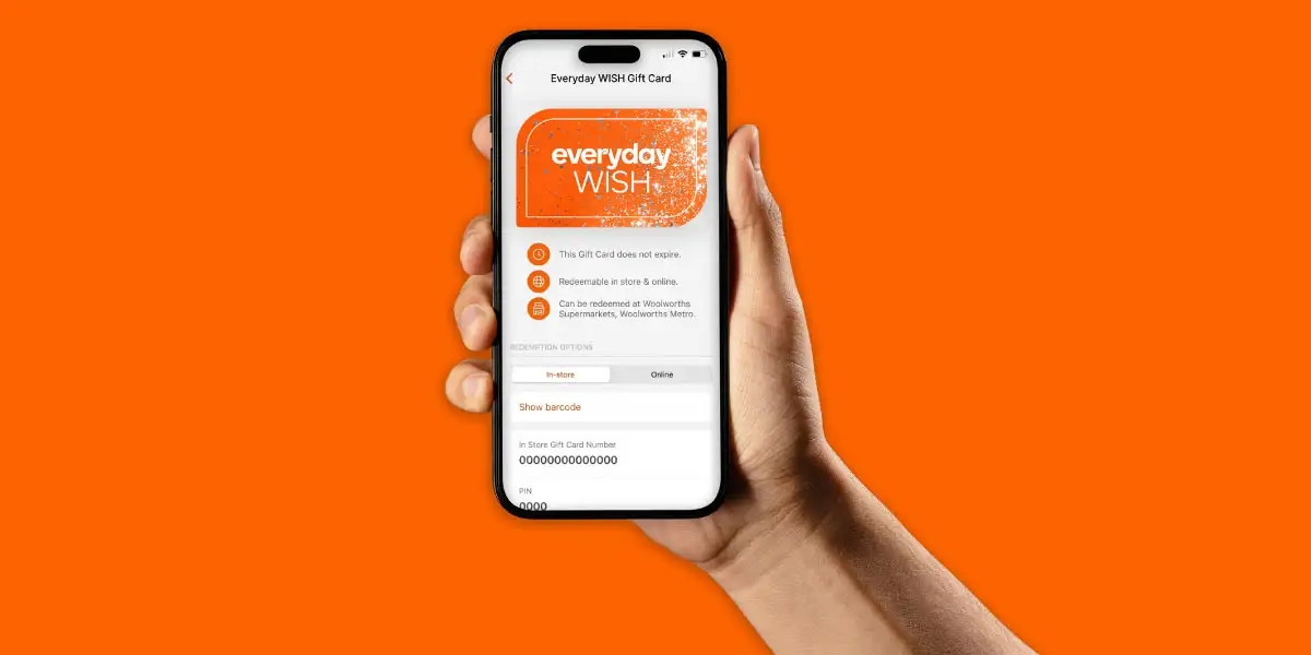 A hand holding a smartphone displaying the Everyday Gifting page.